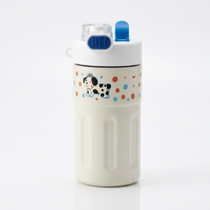Culinara 500ml kids insulated stainless steel tumbler in cream with polka-dot spotted puppy design, white lid, blue safety lock, and subtle base reflection on a bright white background.